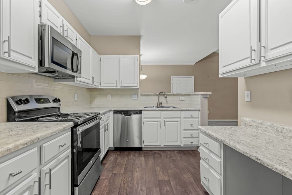 Modern Kitchen with Stainless Steel Appliances at The Marq at Brookhaven
