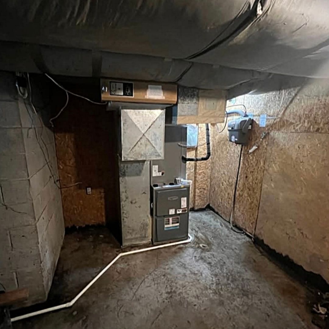 There is a furnace in the corner of the room.
