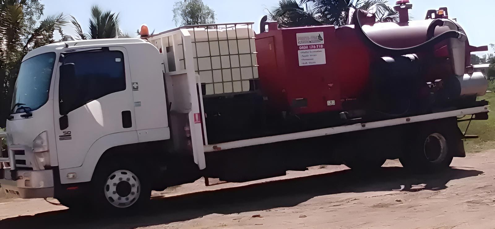 A White Truck Featuring A Red Tank In The Back — Porta-Vac in Proserpine, QLD