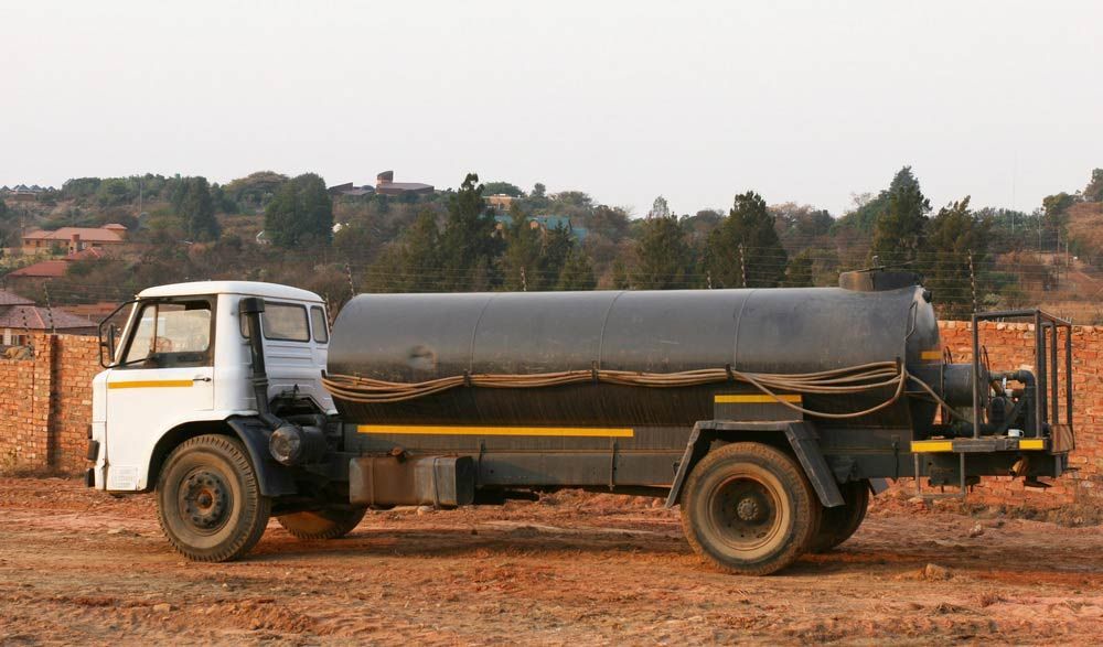 Water Tanker Truck Filled With Water — Porta-Vac in Cannonvale, QLD