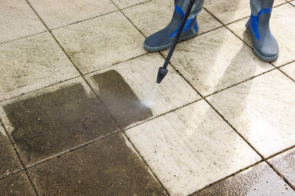 Outdoor Floor Cleaning With High Pressure Water Jet — Porta-Vac in Moranbah, QLD