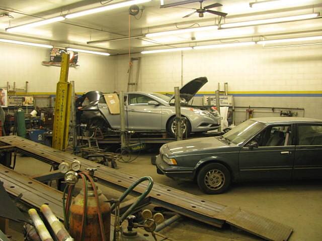 Cars in a shop - Auto body shop in Springfield, MA