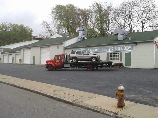 Tow tuck - Auto body shop in Springfield, MA
