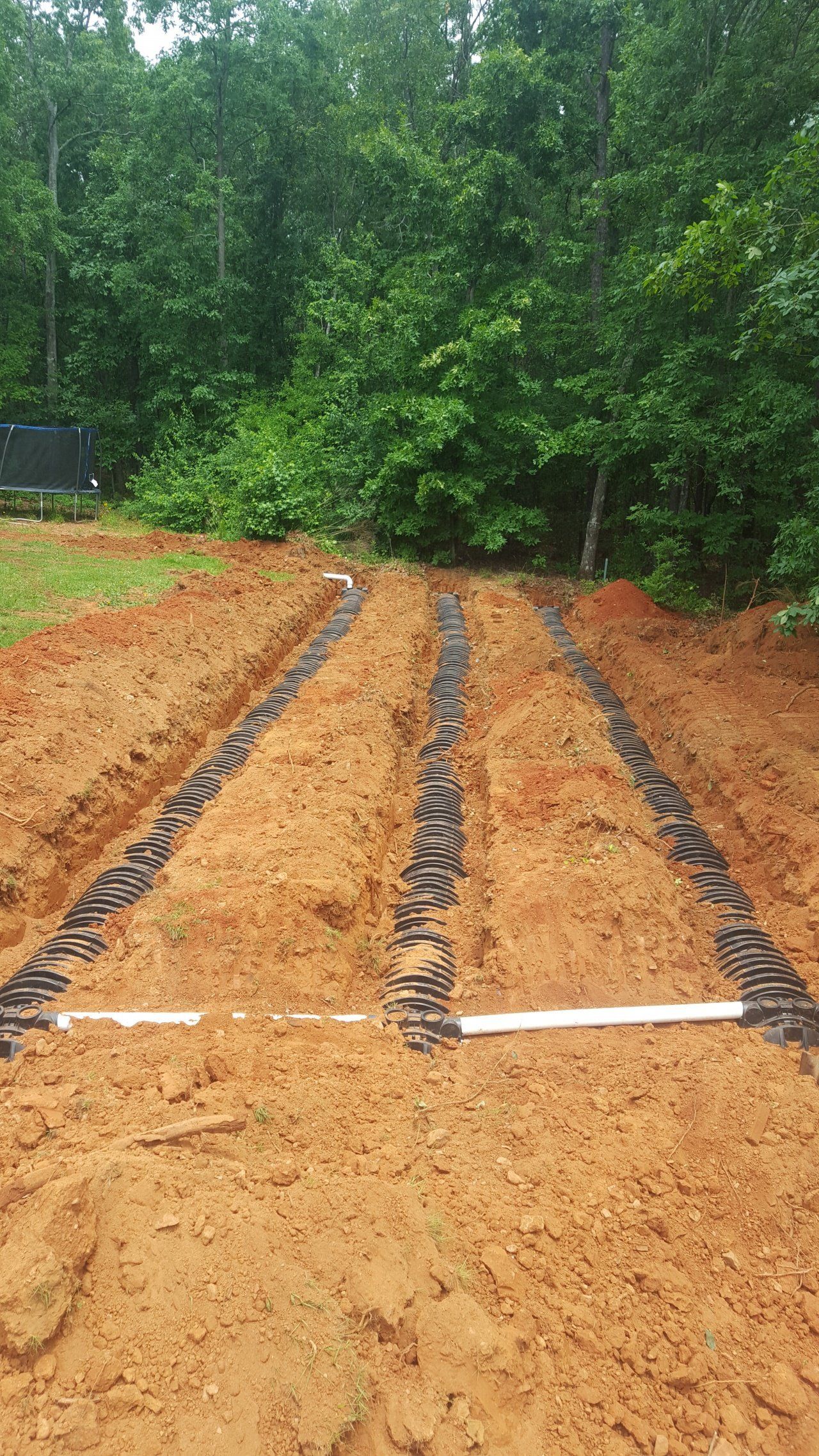 Burrowed Pipes — Statham, GA — Affordable Septic Service