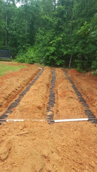 A task of septic pumping services being done in Watkinsville, GA