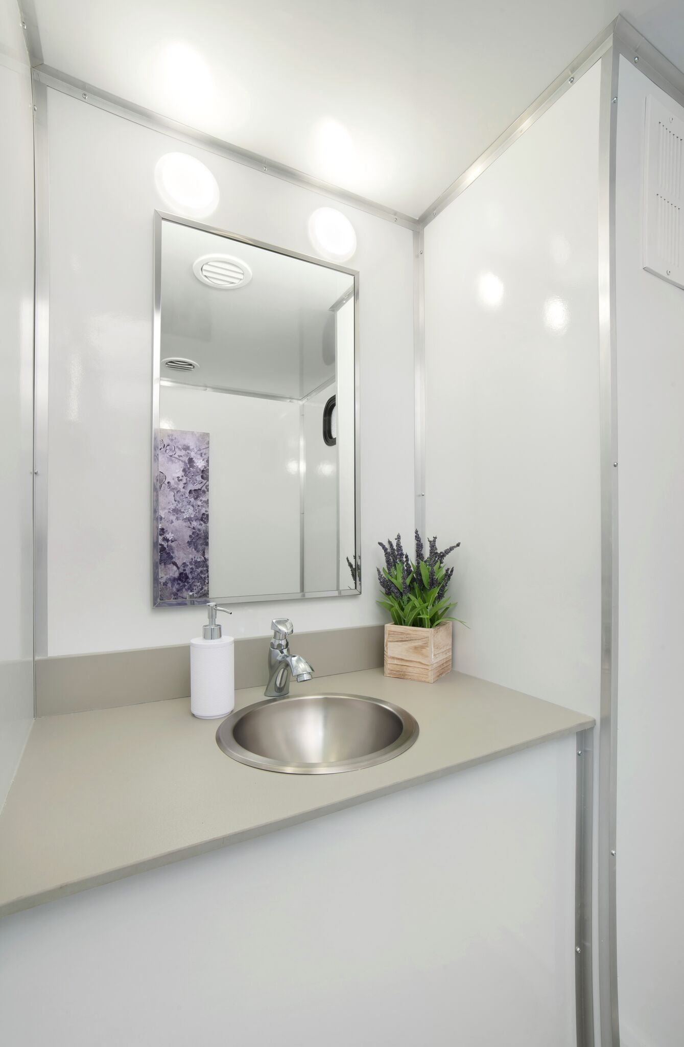 Toilet Room with Mirror and Sink — North Jackson, MS — Gotta Go Site Service Rentals
