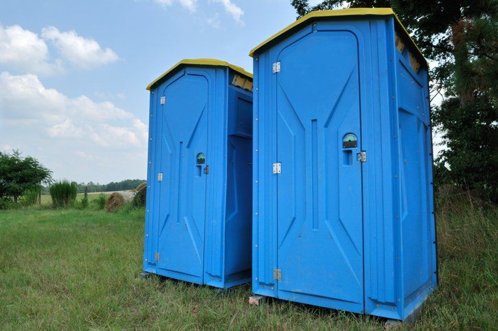 Two Blue Portable Plastic Toilets — North Jackson, MS — Gotta Go Site Service Rentals