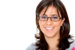 Optometrists — Woman with Eyeglasses in Hutchinson, KS