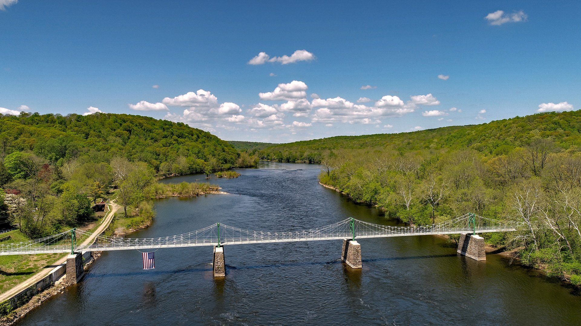Aerial view of the bridge connecting Lumberville, PA, to the Bull's Island Recreation Area across the Delaware River.
