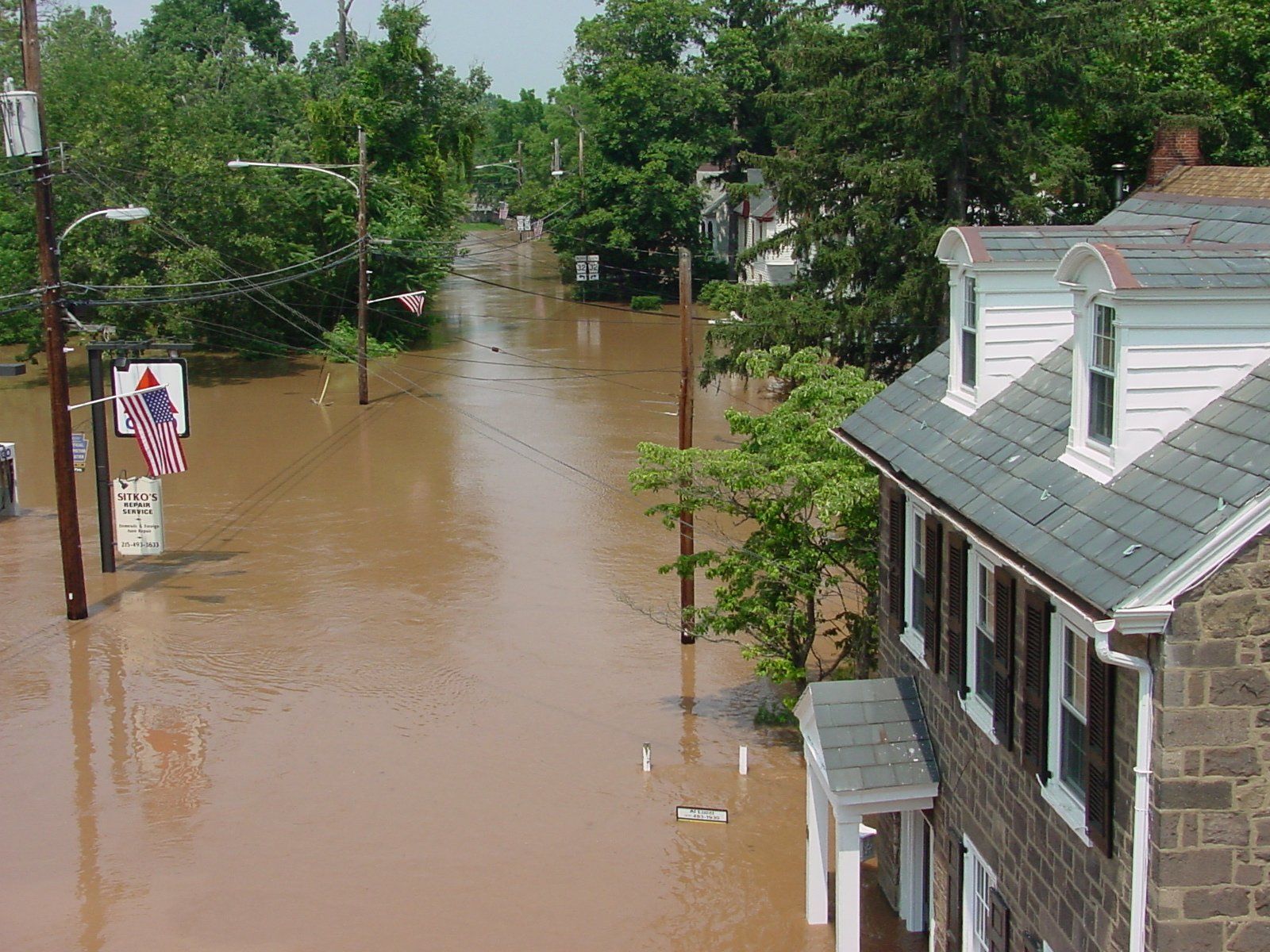 A flooded street in Yardley, PA, is shown during a June 2006 flood.