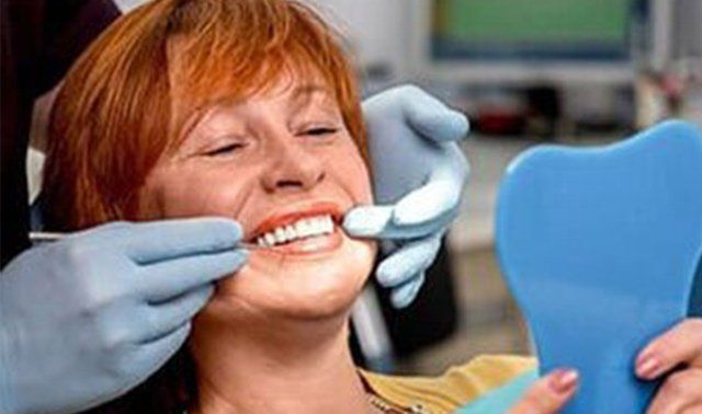 Woman with dental implants — Dental Care in Banning, CA