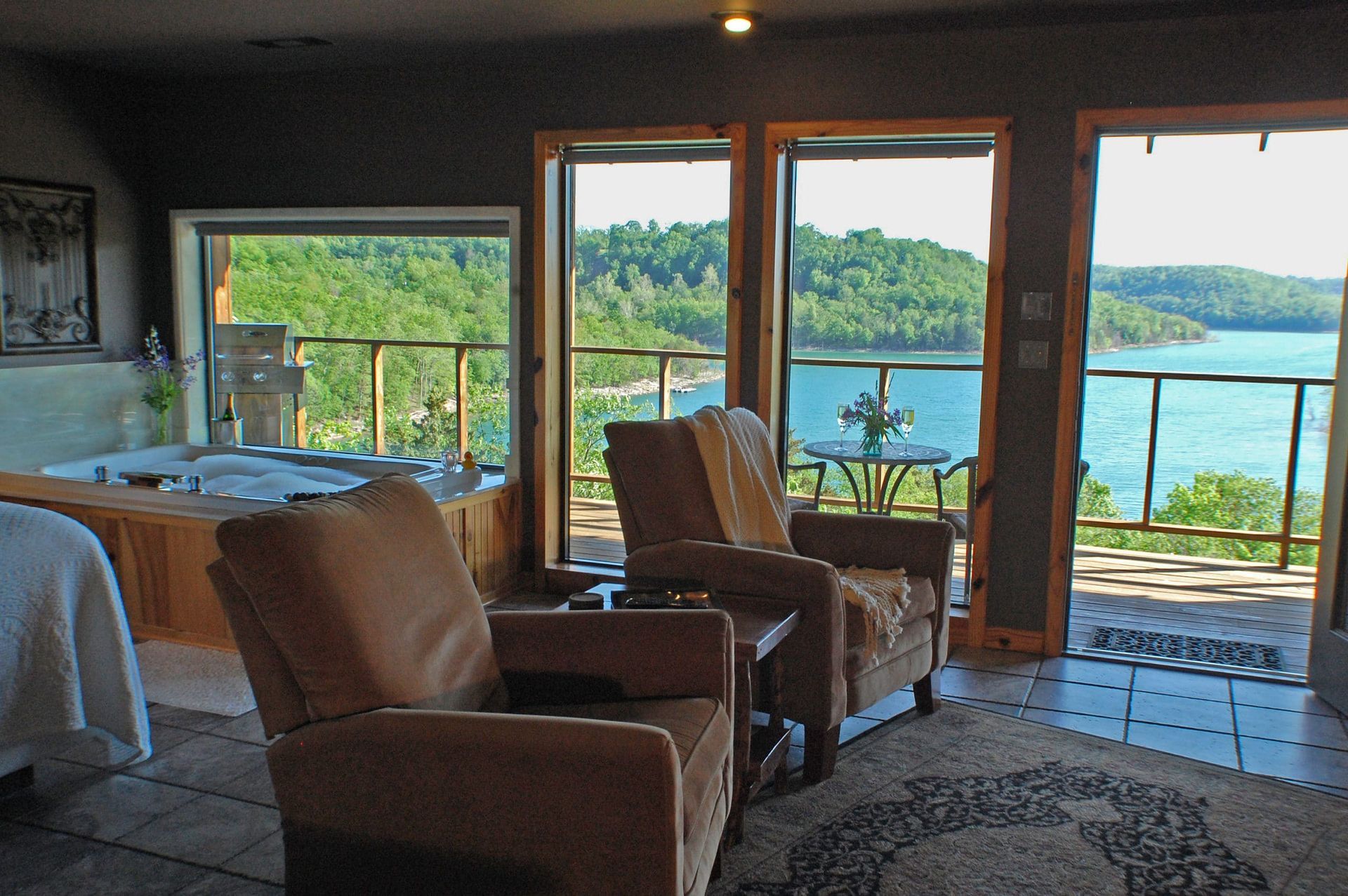 A living room with a view of a lake