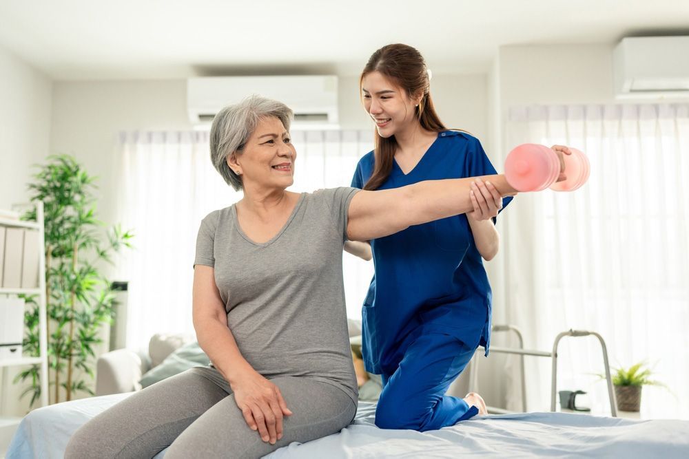 Person in blue leggings exercising with a cable machine, indoors. Focus on the leg and foot.