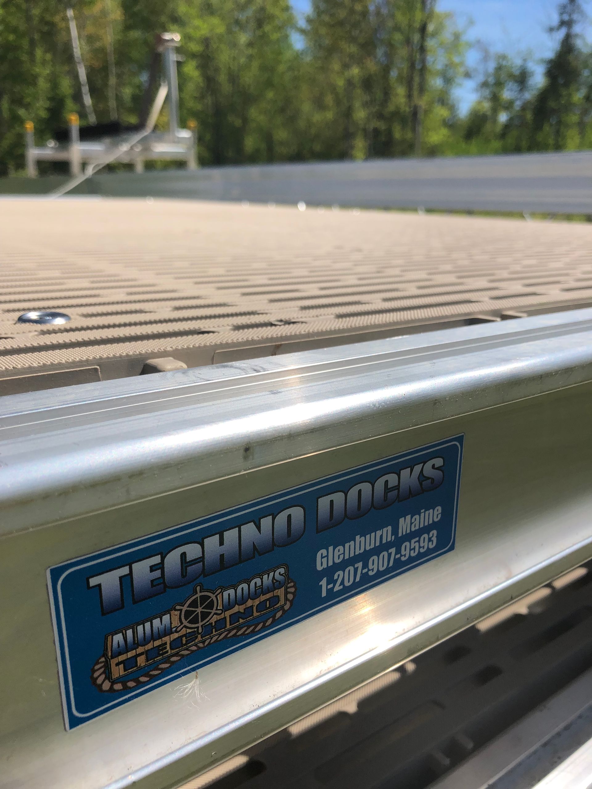 A close up of a dock with a label on it that says techno dock.