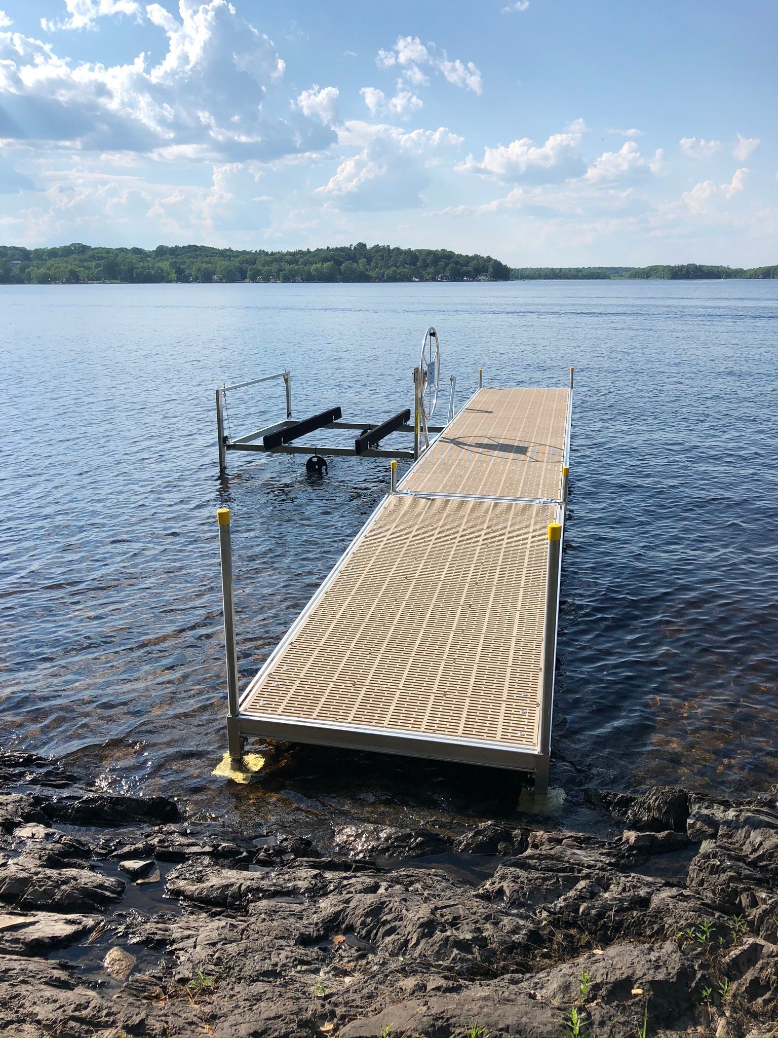 A dock is sitting in the middle of a lake.