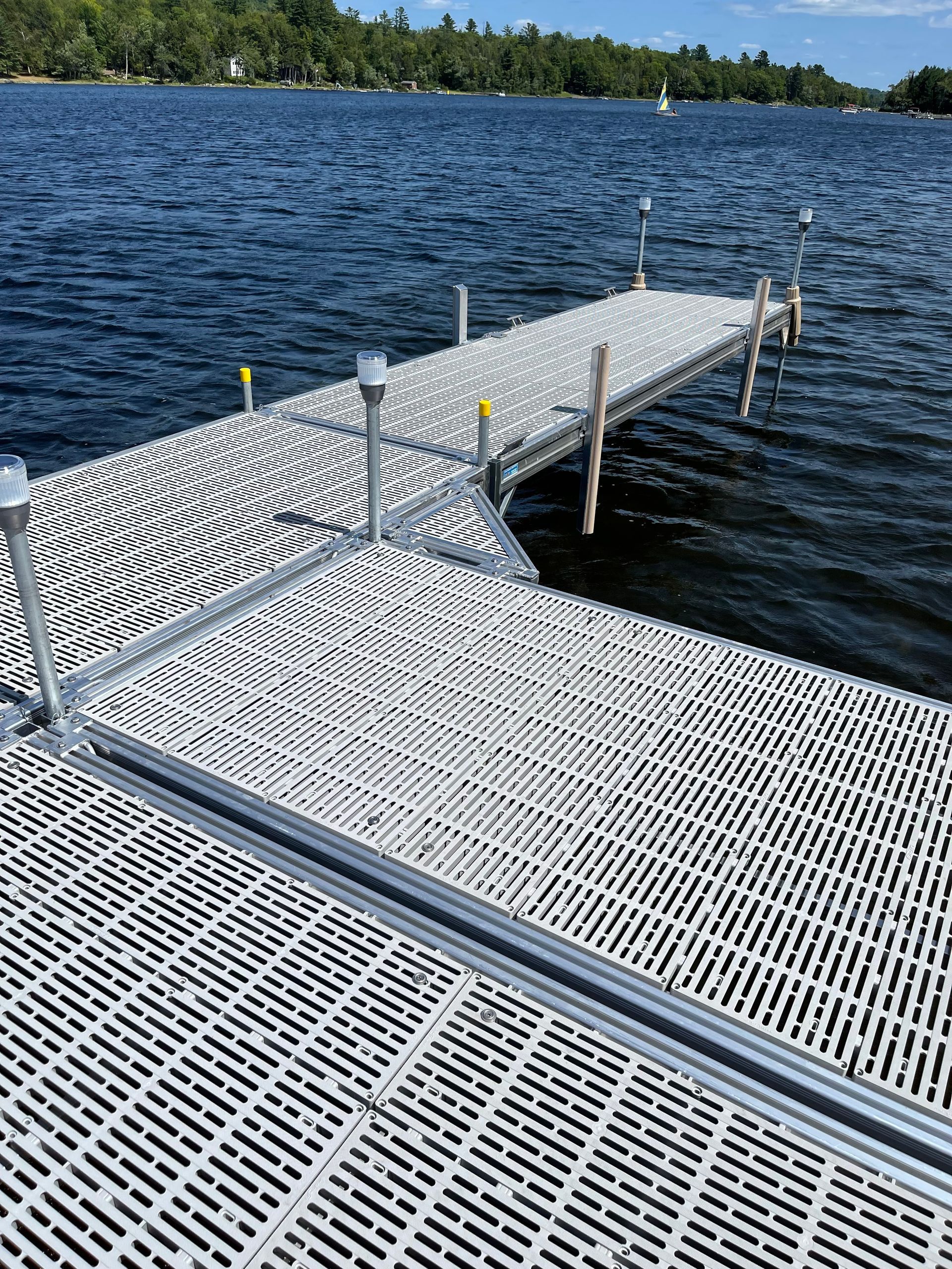 A dock is sitting in the middle of a lake.