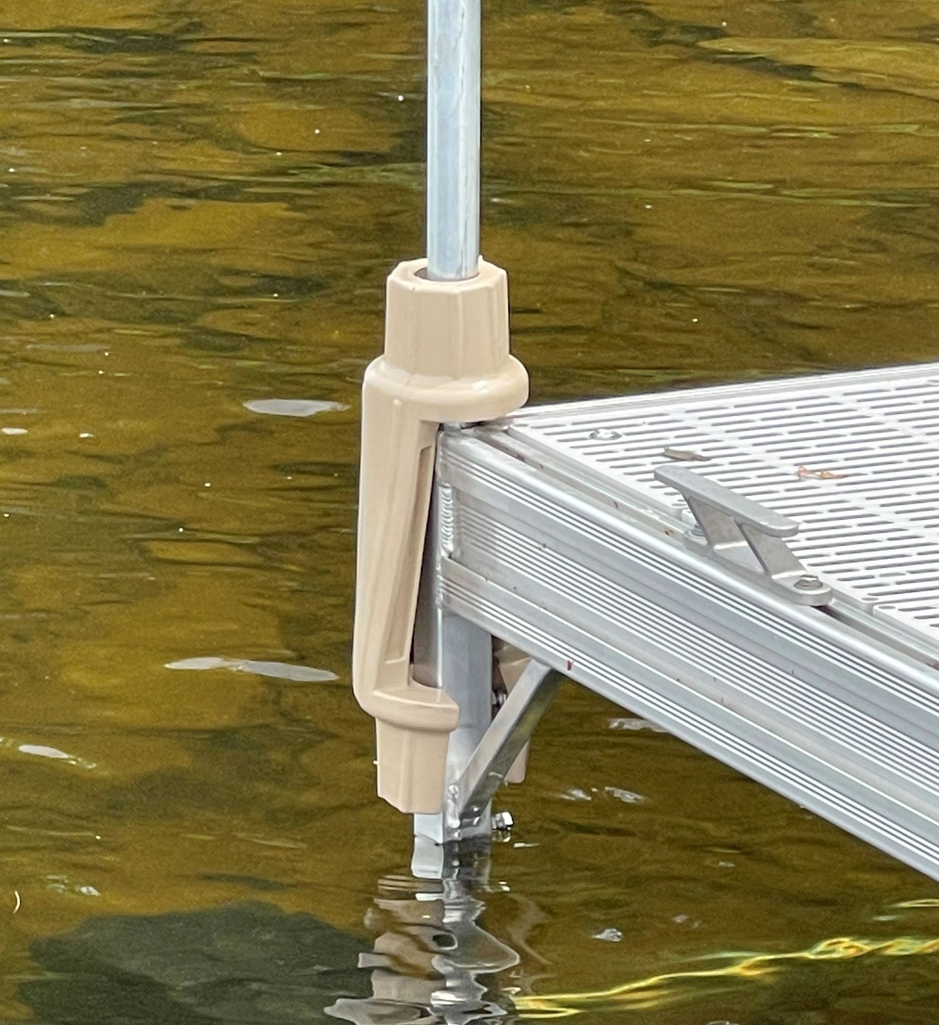A dock is sitting in the middle of a body of water