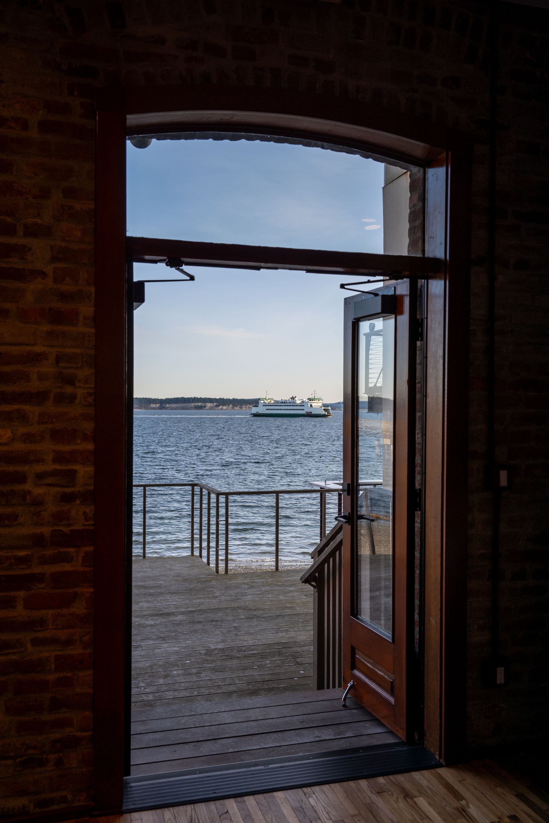 The door is open and looking out on Port Townsend Bay