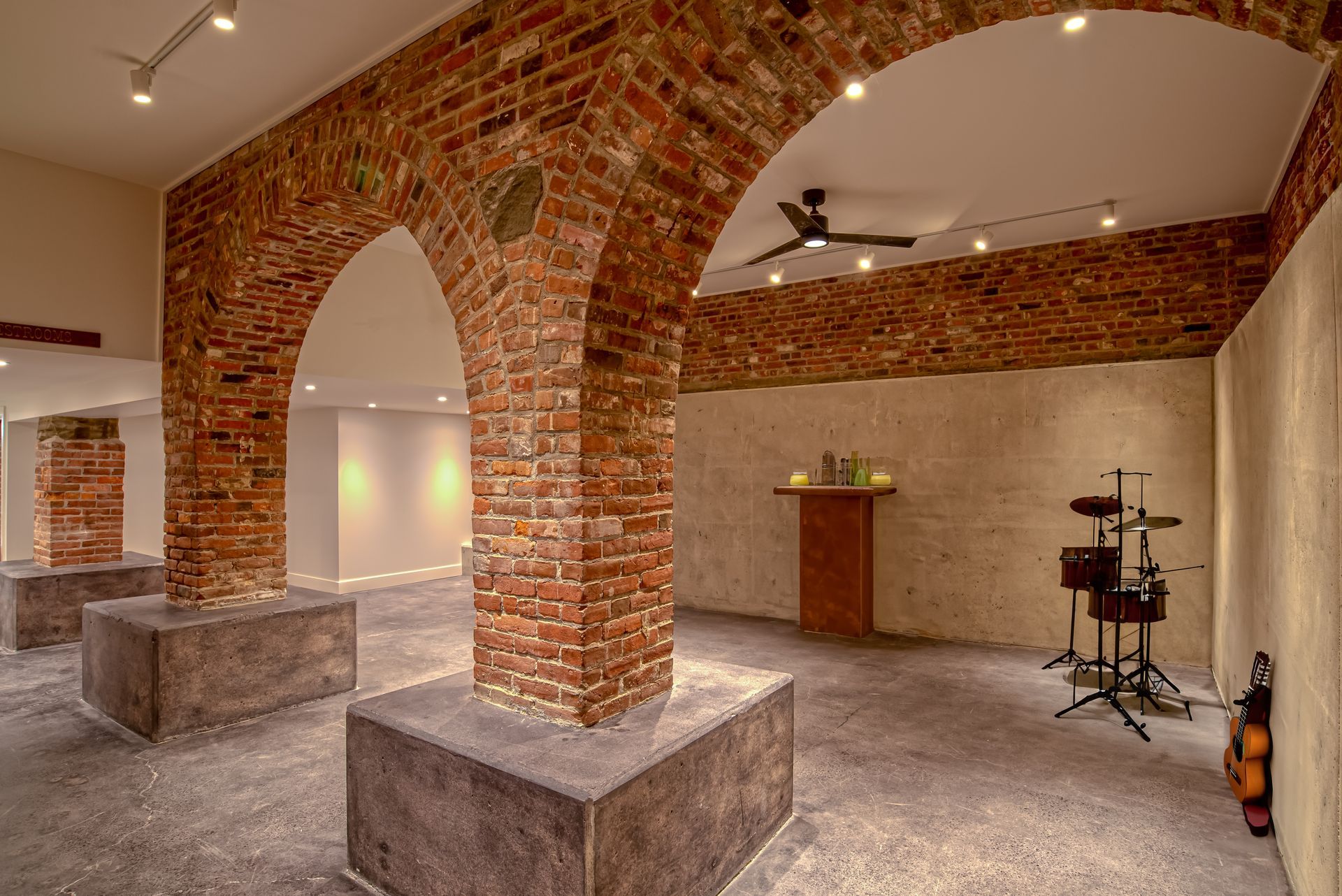 There is a drum set in the middle of the room.