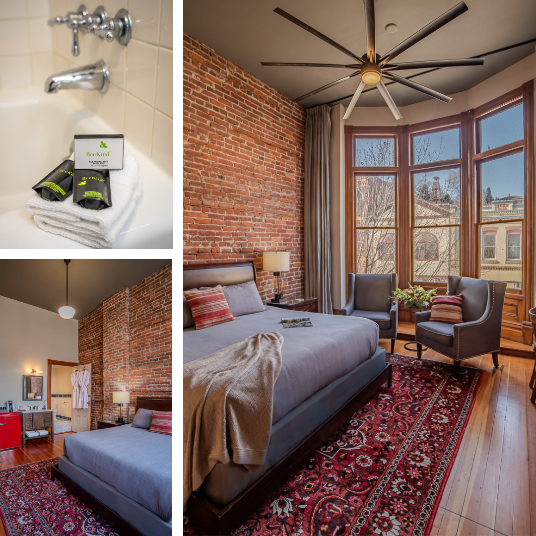 A bedroom with a large bed and a ceiling fan. King-Ensuite-Historic TownView Room 2
Town view with bay window overlooking the historic district. King bed and private bath with shower/tub.