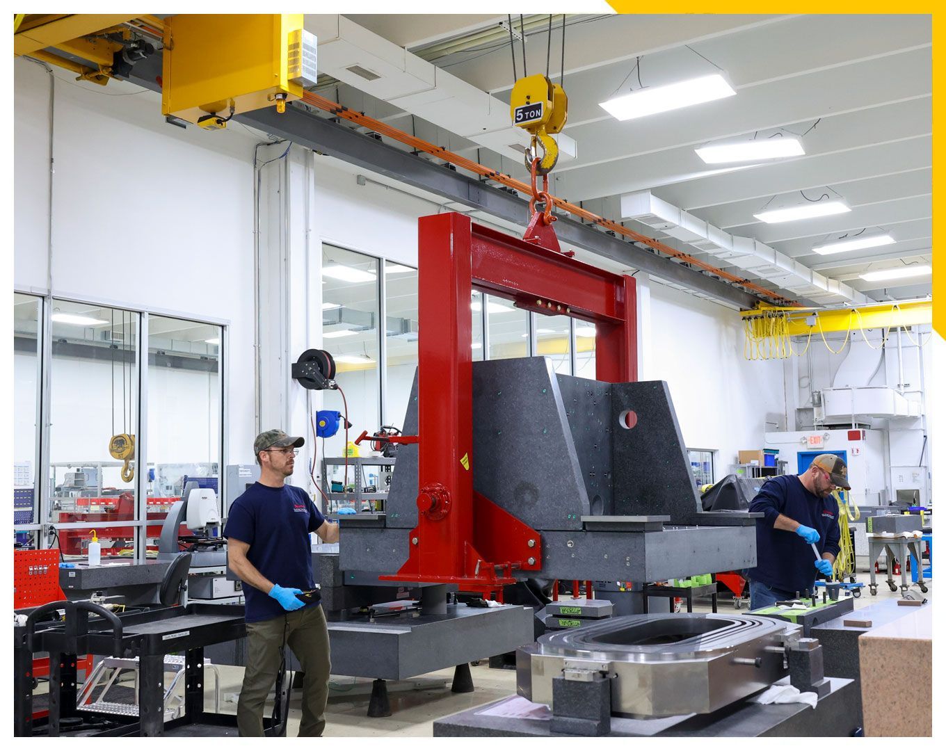 Tru-Stone team working with large, hanging product