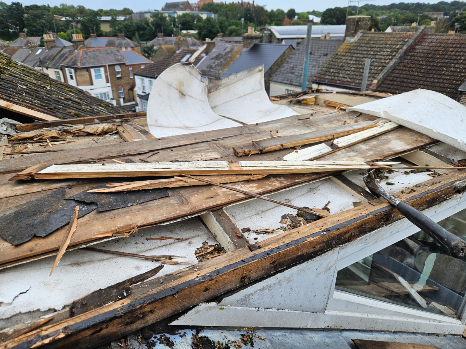 A roof with a lot of pieces of wood on it