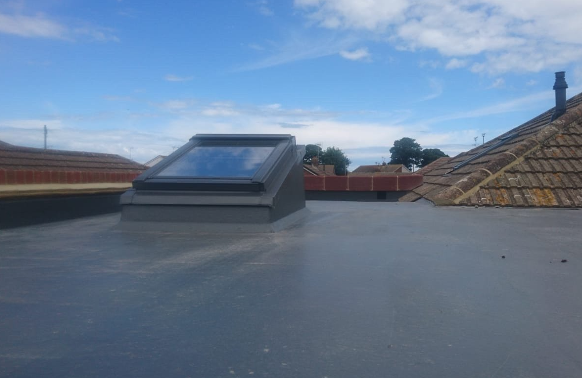 there is a skylight on the roof of a building .