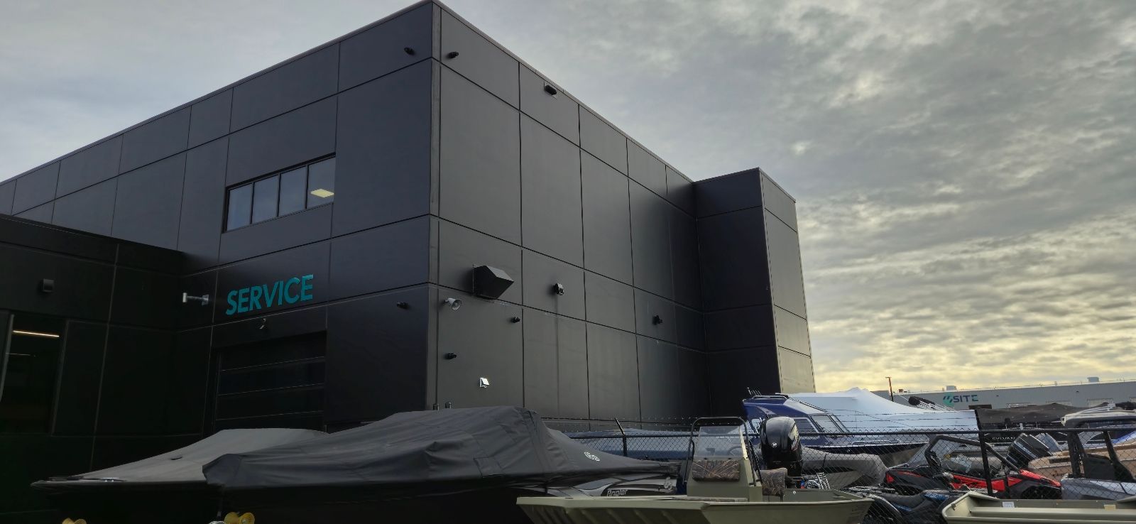 A dark, modern building with 