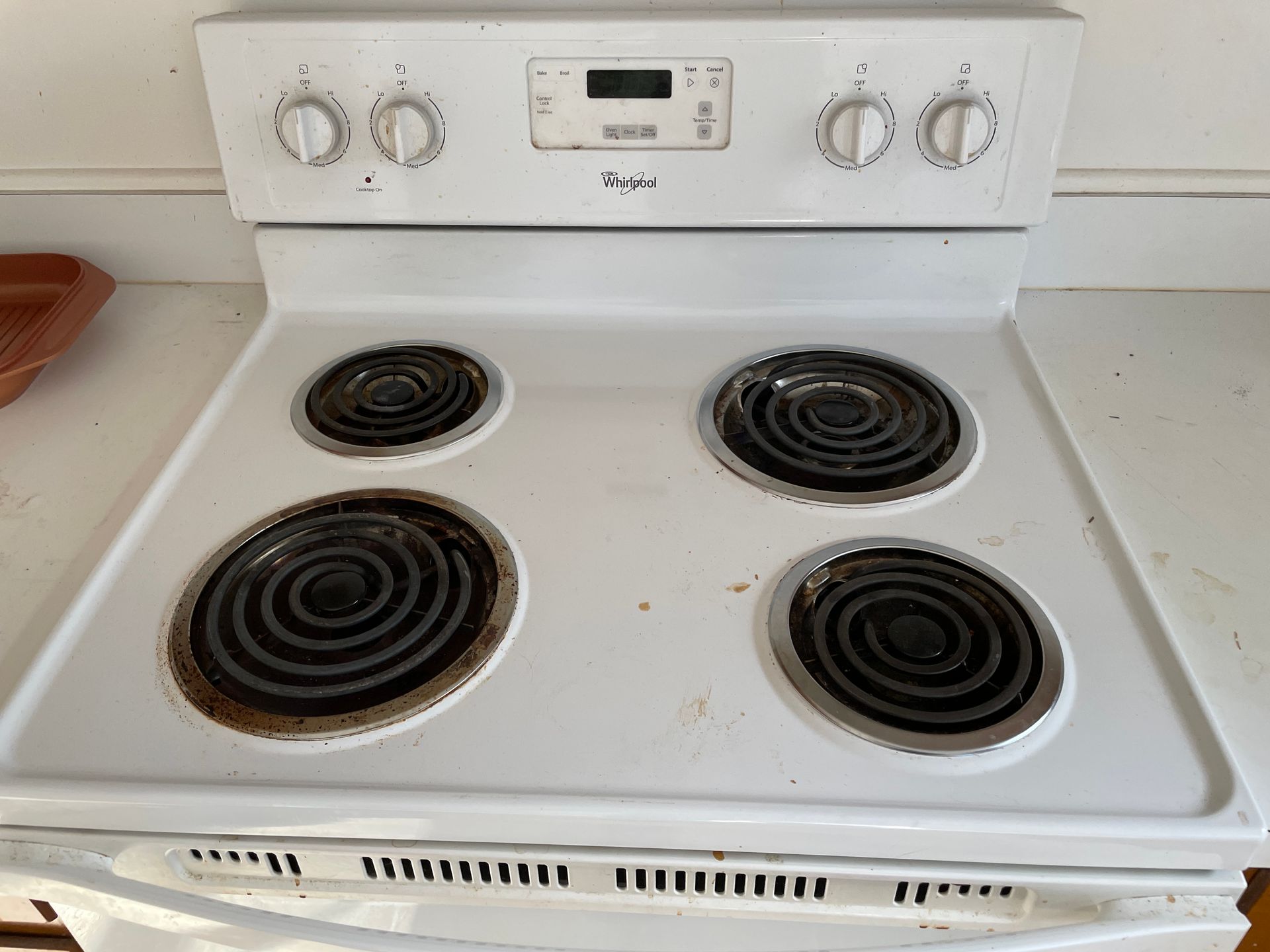 Stove top before house cleaning