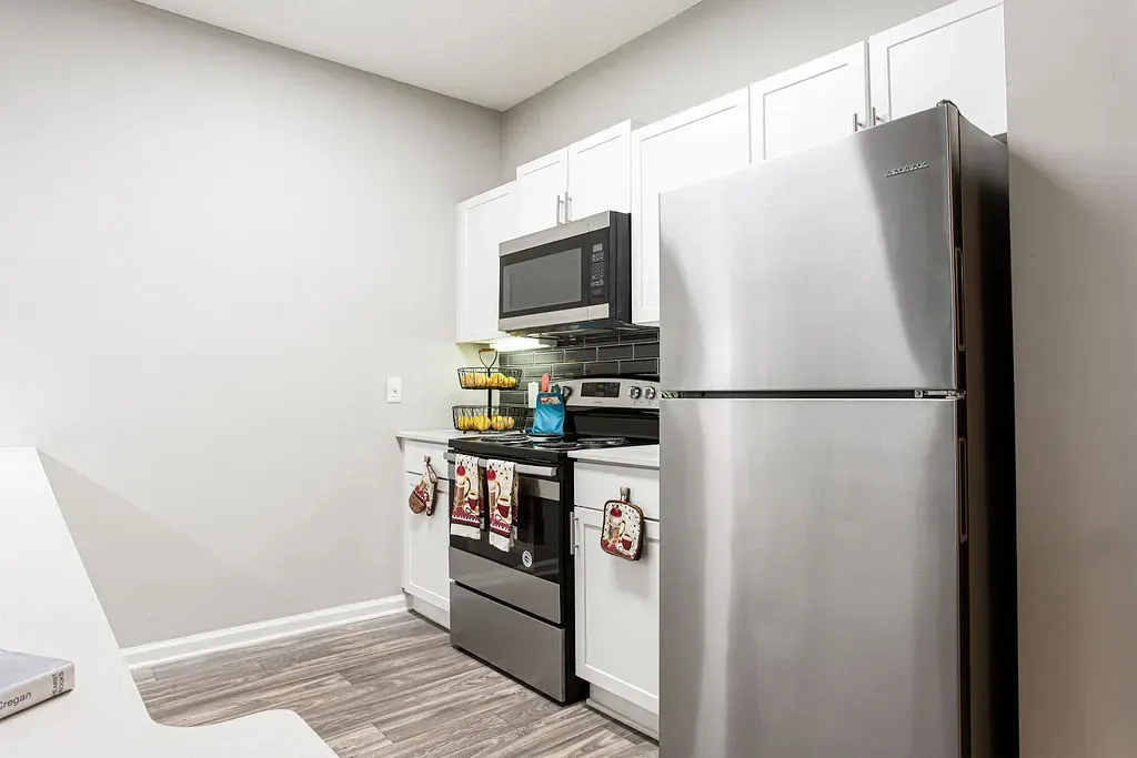 Kitchen with appliances at Preserve at Mill Creek, Buford, GA 30519