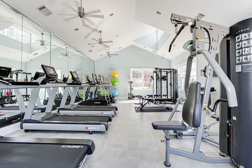 Renovated Fitness Center with equipment at Preserve at Mill Creek, Buford