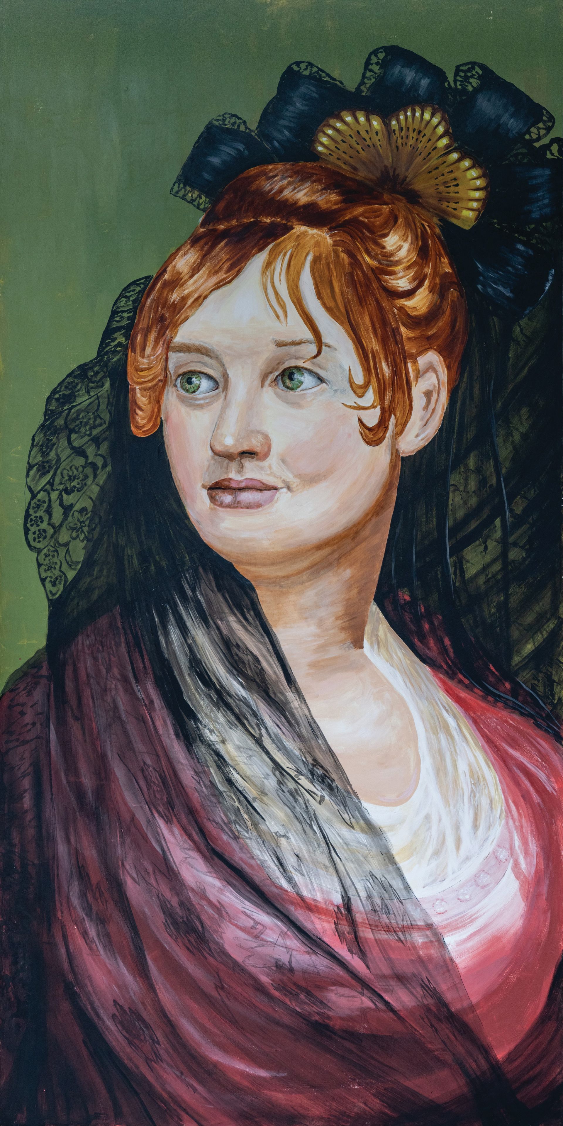 a woman is painting a large British flag artwork