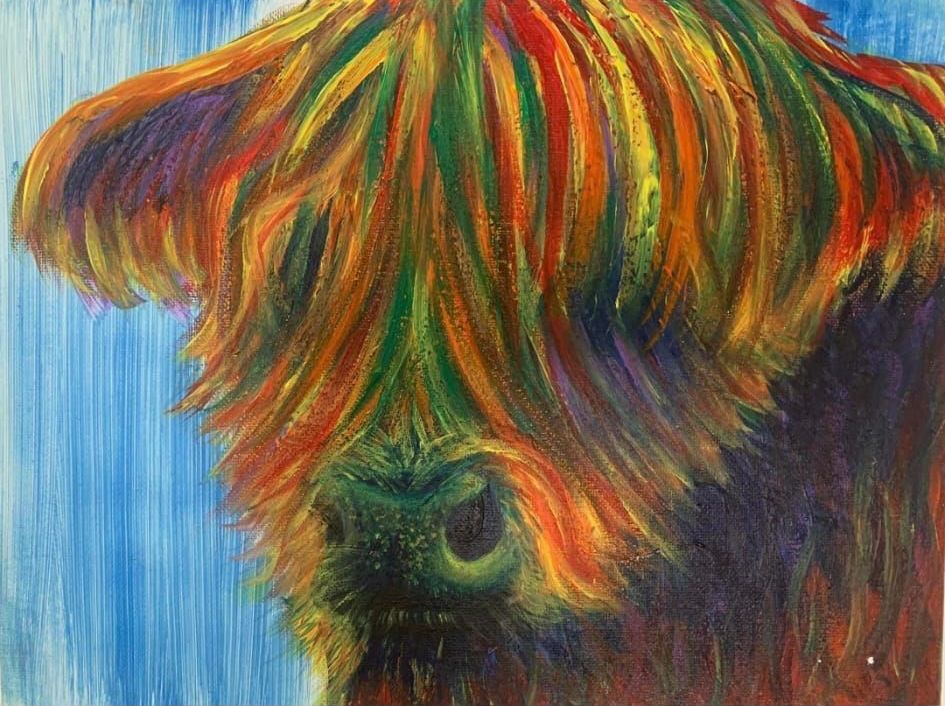 a close up of a colorful painting of a cow