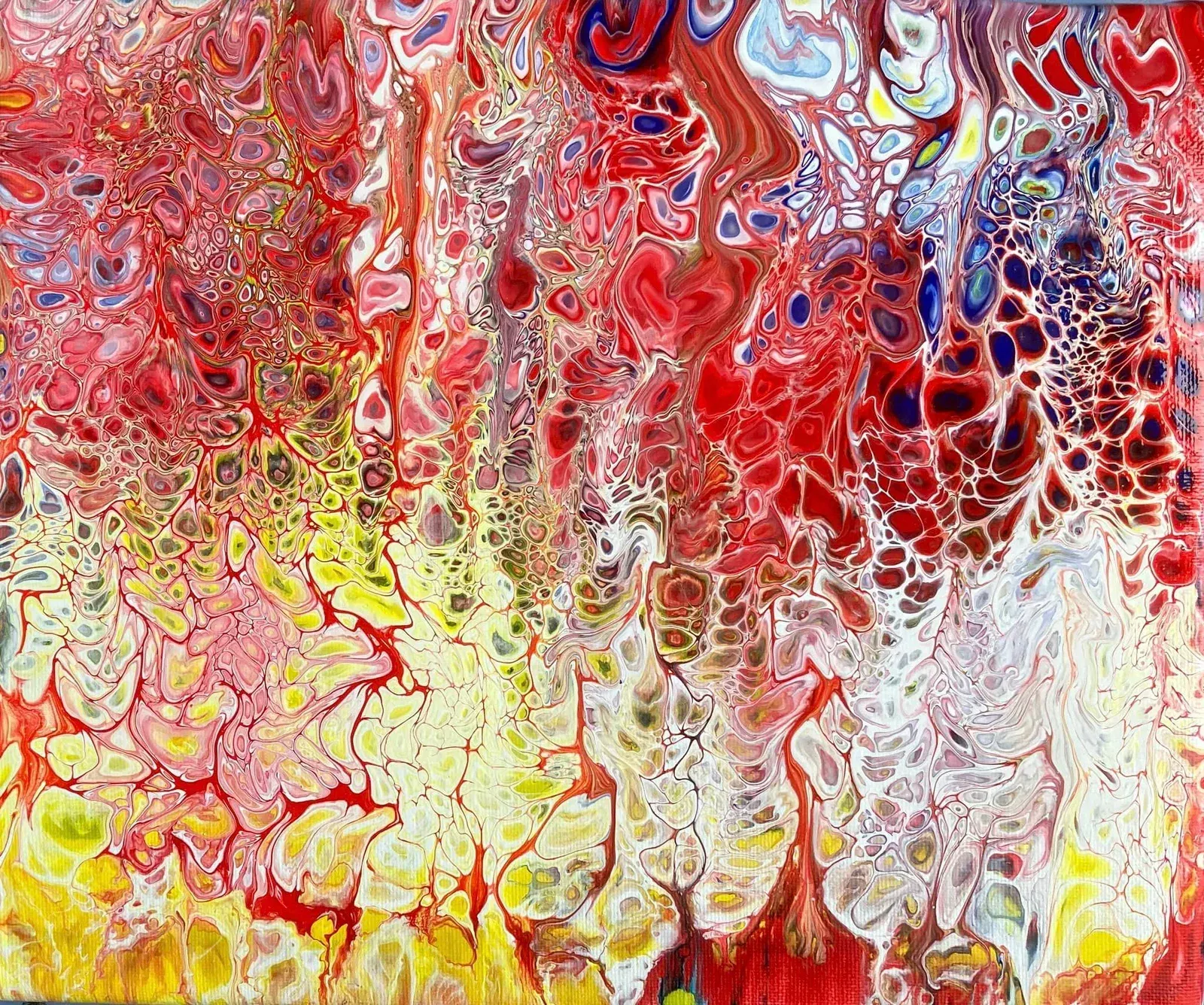 a close up of a colorful painting on a canvas .