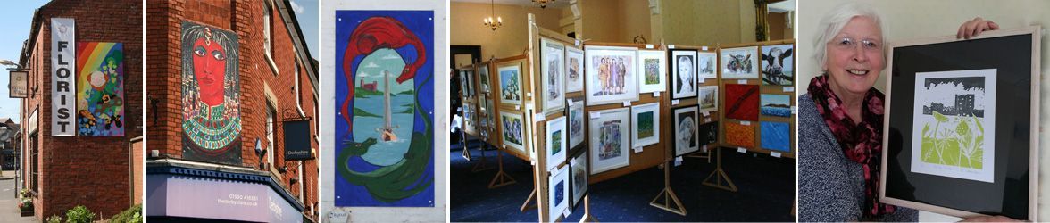 a woman is standing in front of a wall with paintings on it .
