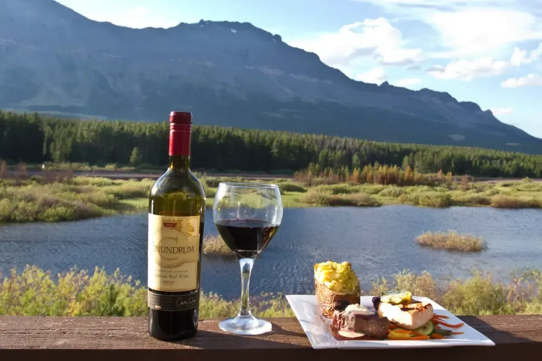 A close up of a fish taco on a white plate.