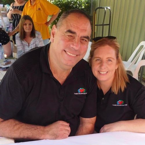 Founder and CEO Shane Perkins and wife Cathie are posing for a picture.