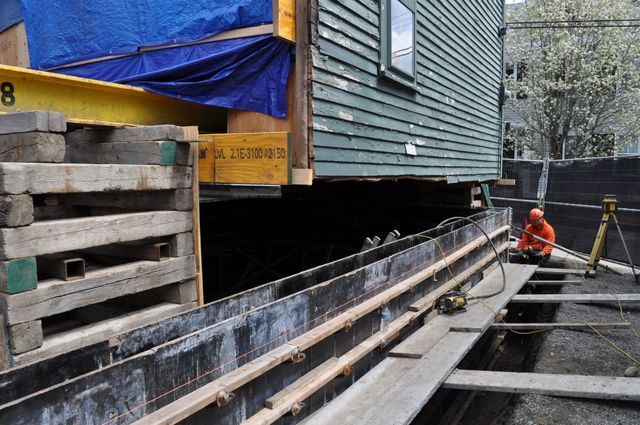 a building under construction with the number 8 on it