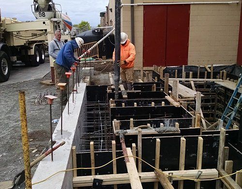 a concrete truck with the number 98 on it