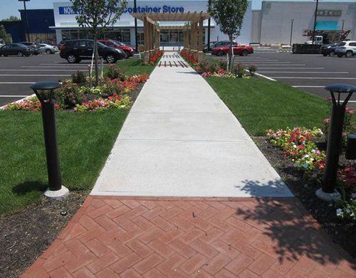 a walkway in front of a container store