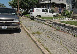 a chevrolet van is parked on the side of the road