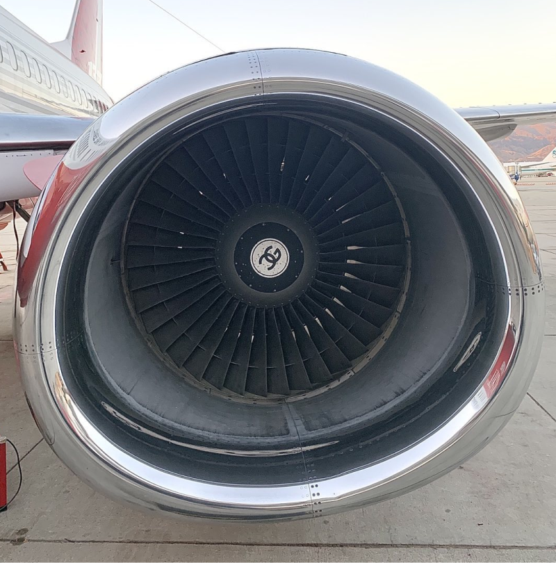 An airplane engine with the number 69 on it