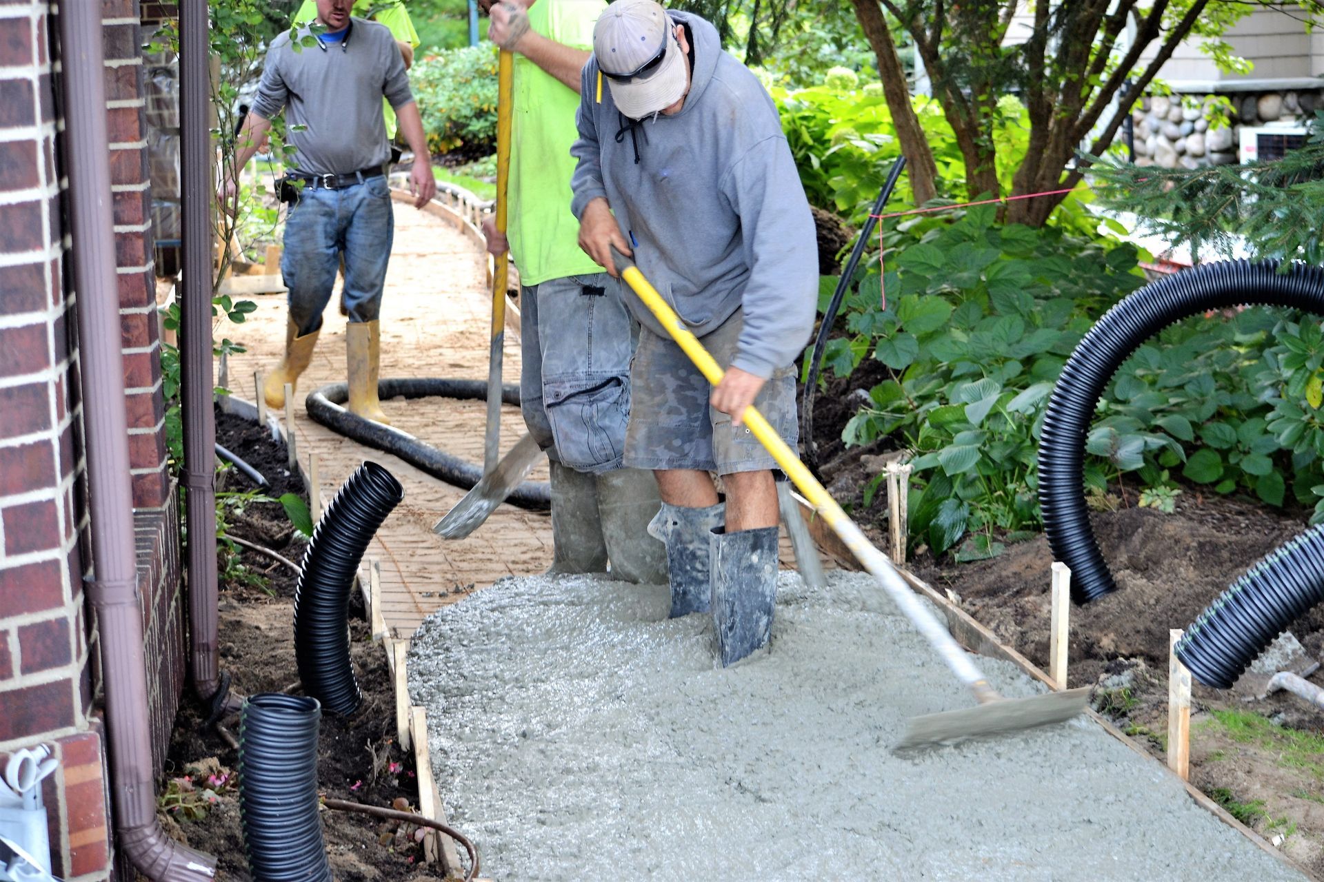 paving a concrete walkway for home improvement project