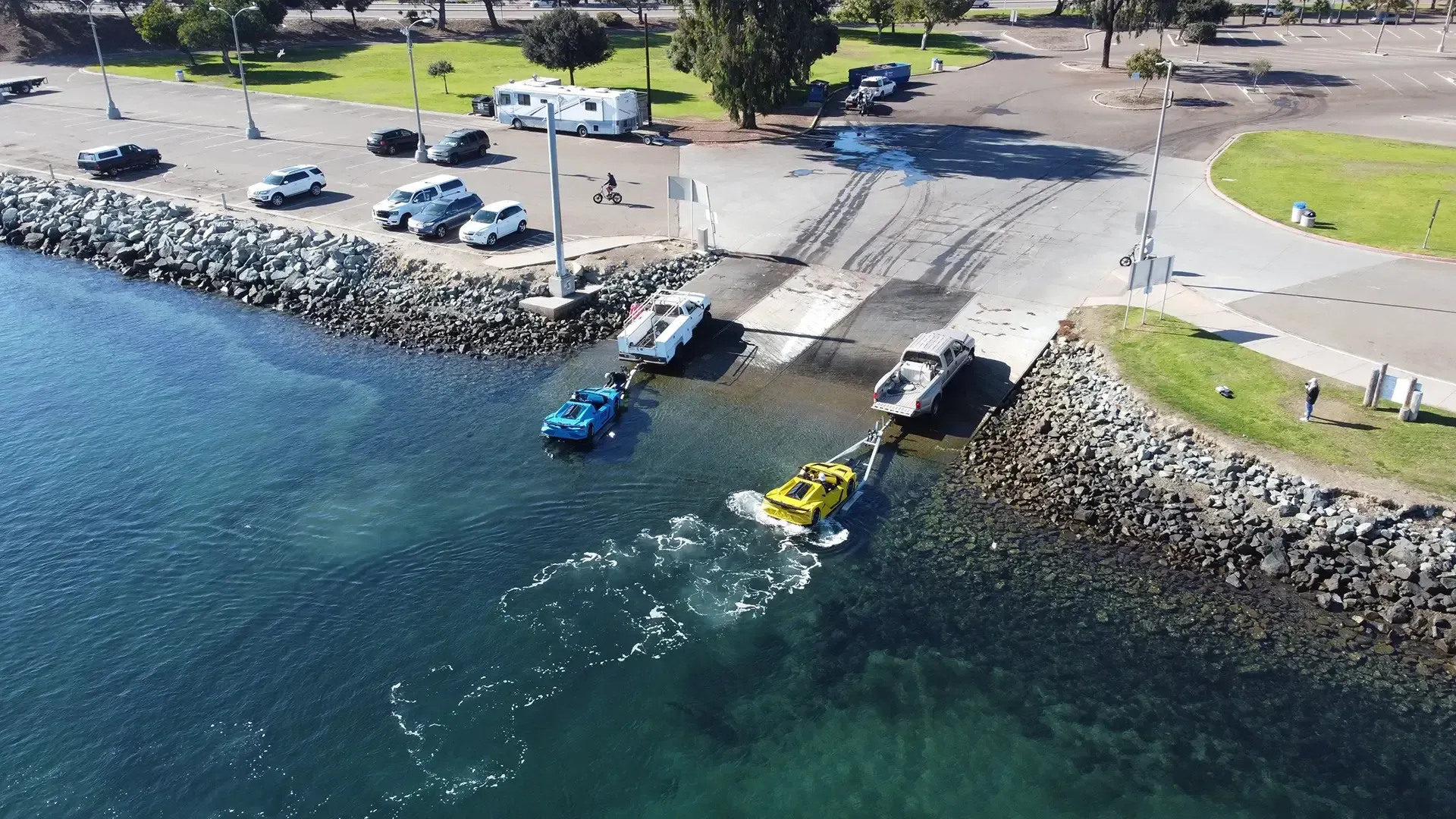 An aerial view of a boat being towed into the water