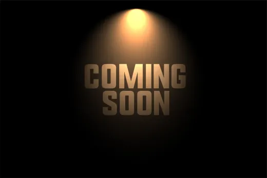 A spotlight is shining on the words coming soon