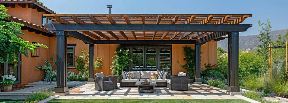 A Lindenhurst, IL house with a pergola and patio furniture in front of it.