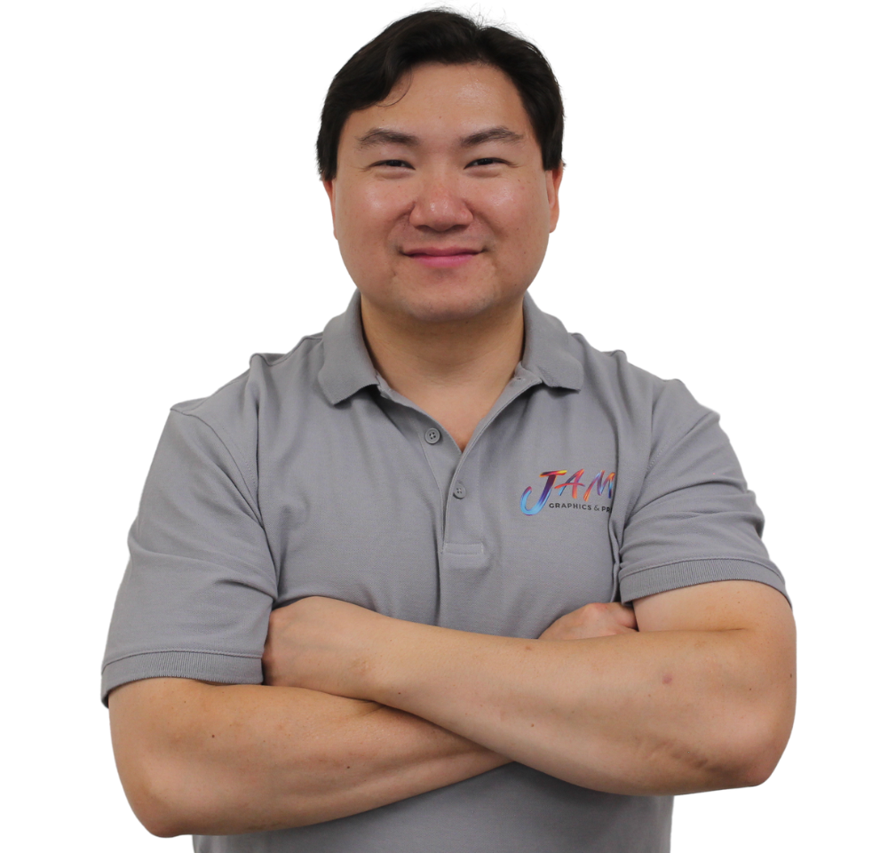 A man wearing a grey shirt with the word team on it