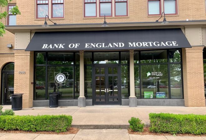 The bank of england mortgage building has a black awning over the entrance.