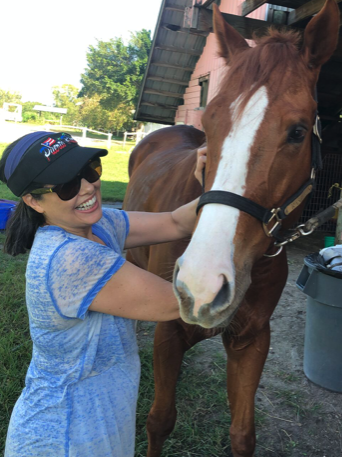 Nydia Menéndez With Horse- Fort Lauderdale, FL - Menéndez Law Firm
