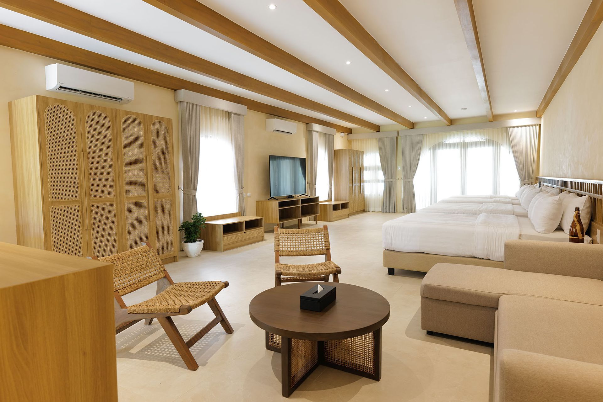 A pair of glasses sitting next to a remote control on a couch.